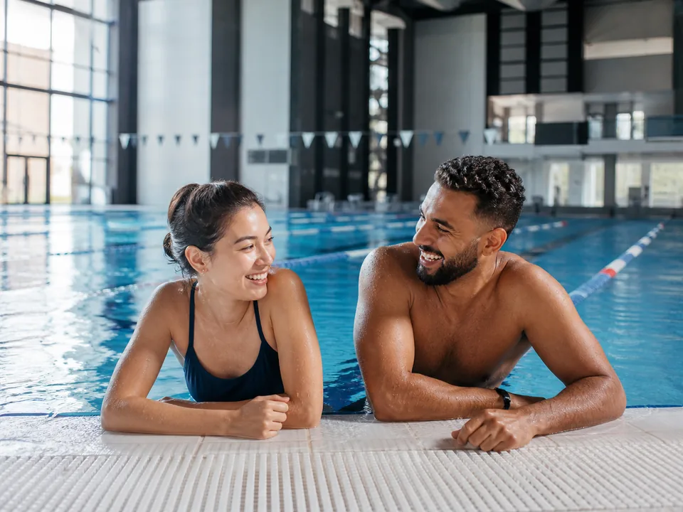 Swimmer training in a modern indoor pool